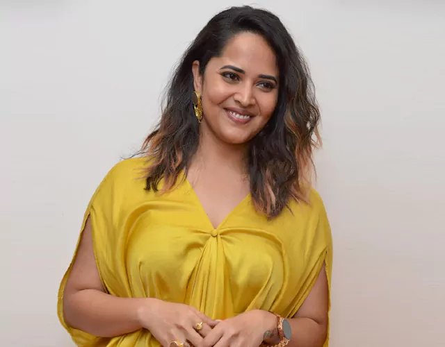 Anasuya Yellow Color Dress Photos